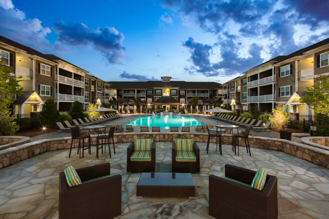 centennial holding condominium pool side with view of apartments